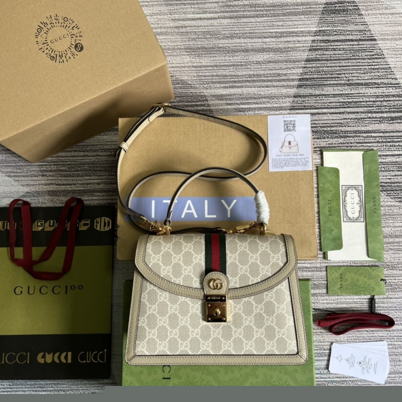 G*u*i top handle bags
